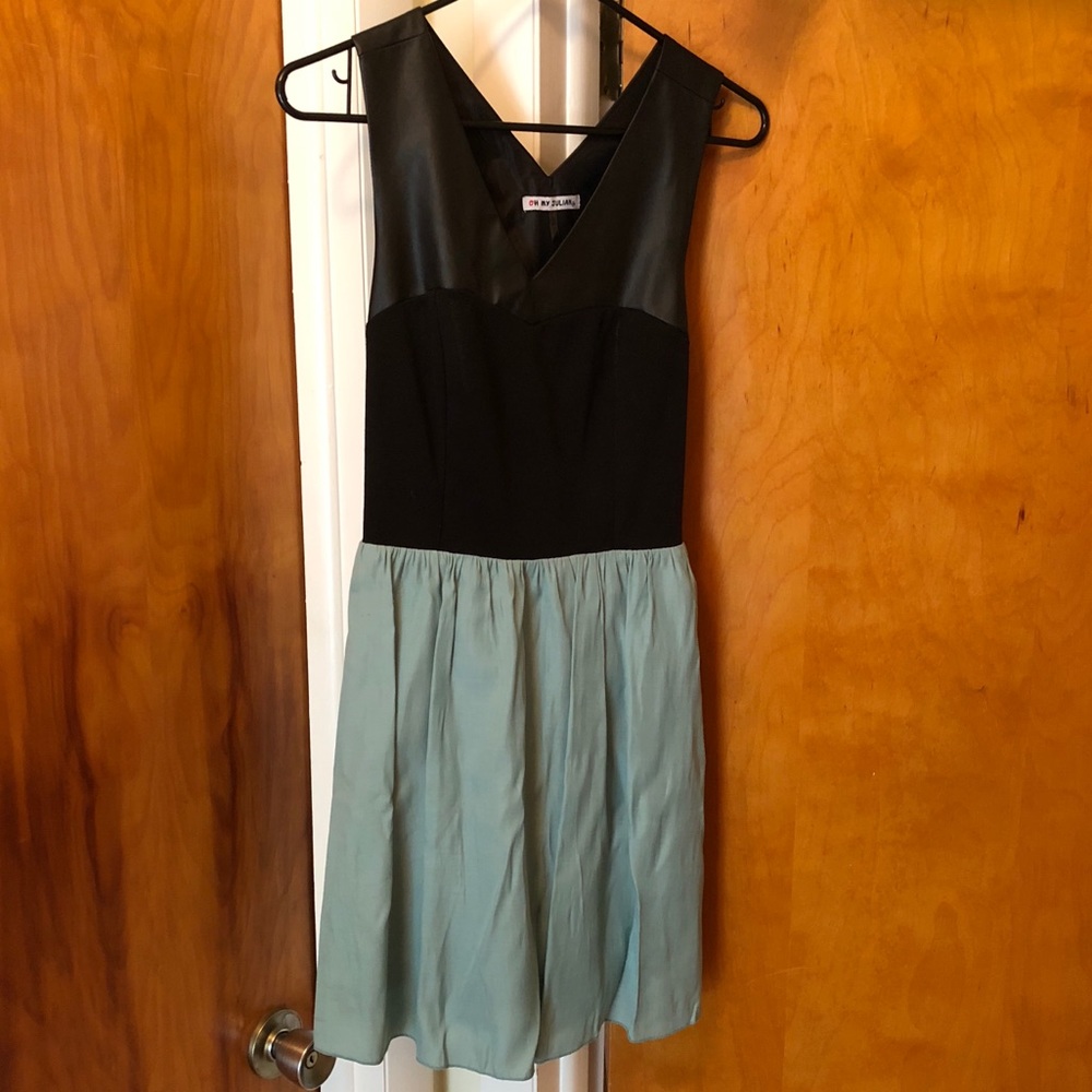 Black top with faux leather and teal skirt dress